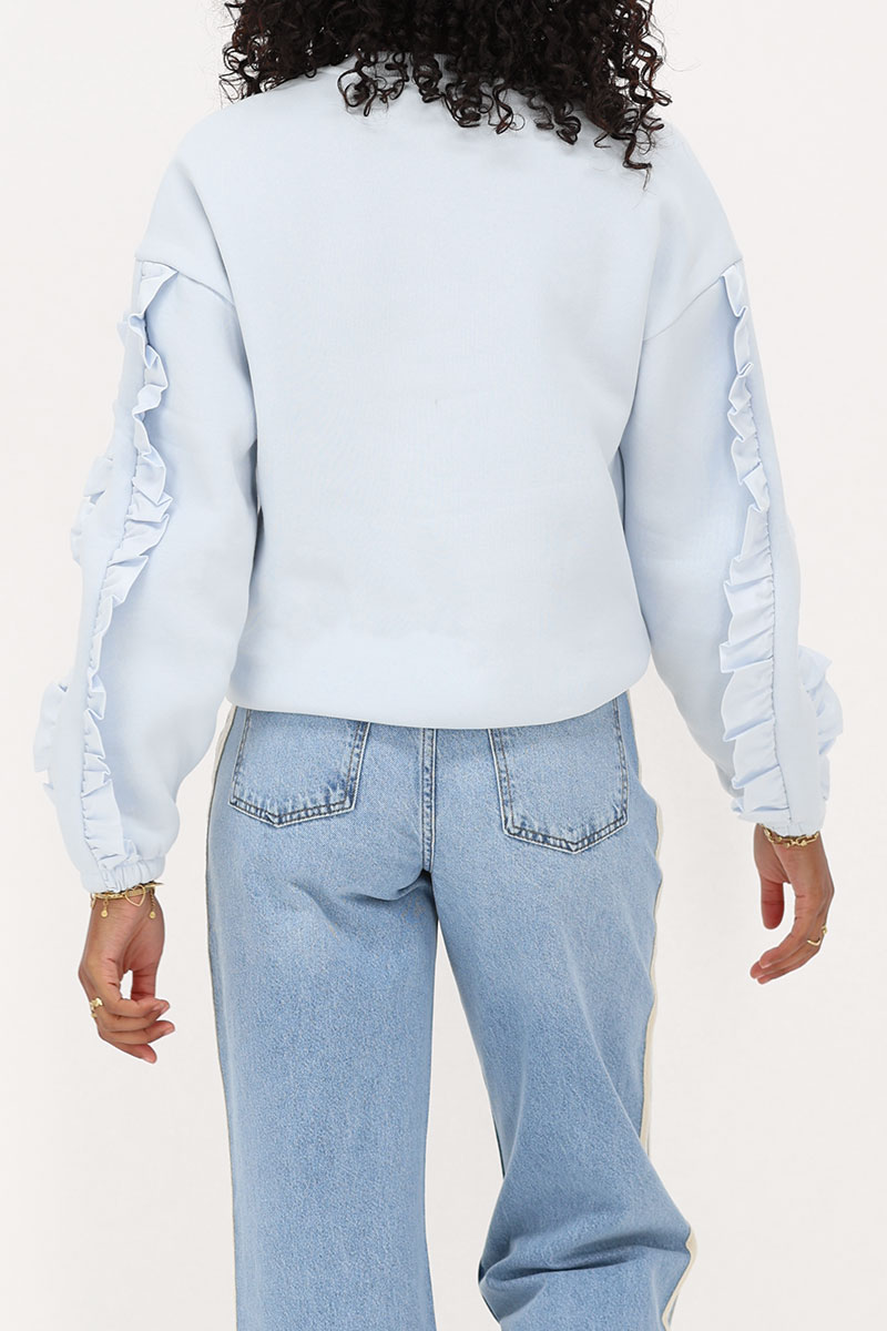 Light blue woven sweater with ruffle | My Jewellery