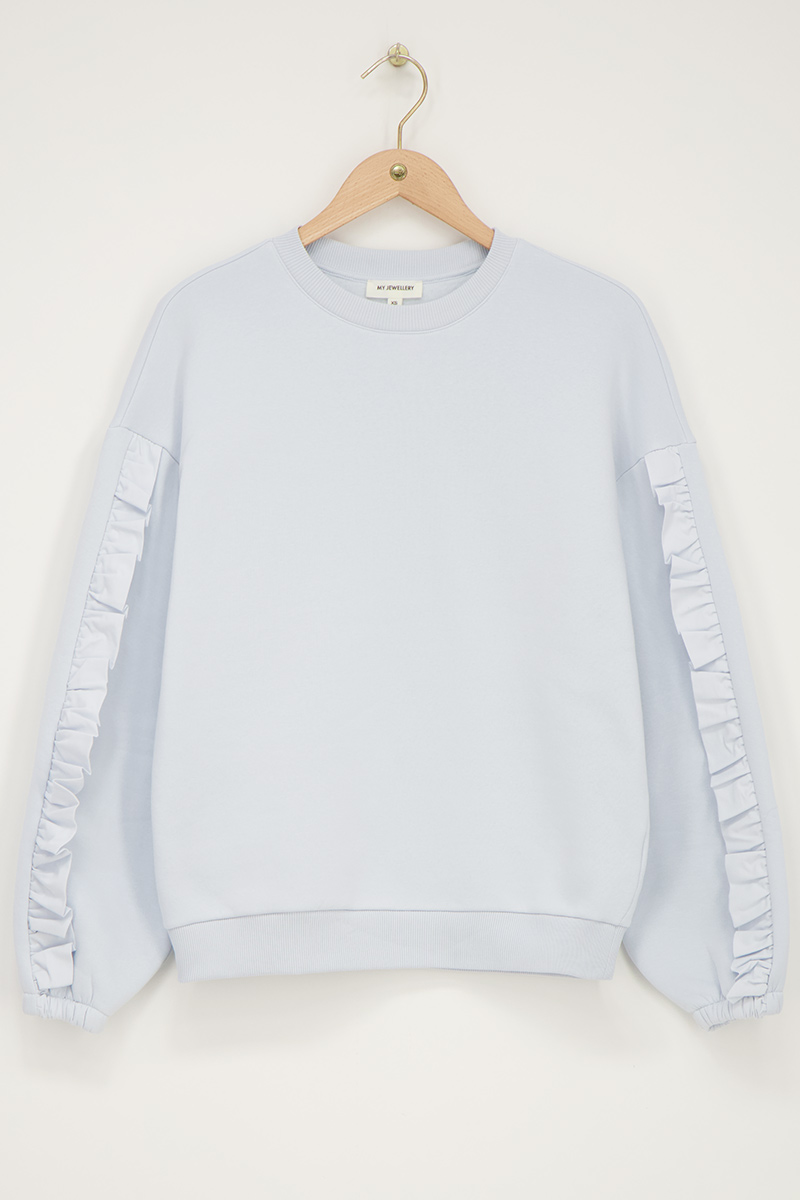 Light blue woven sweater with ruffle | My Jewellery