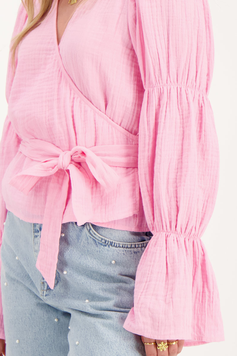 Pink blouse with wide sleeves and bow