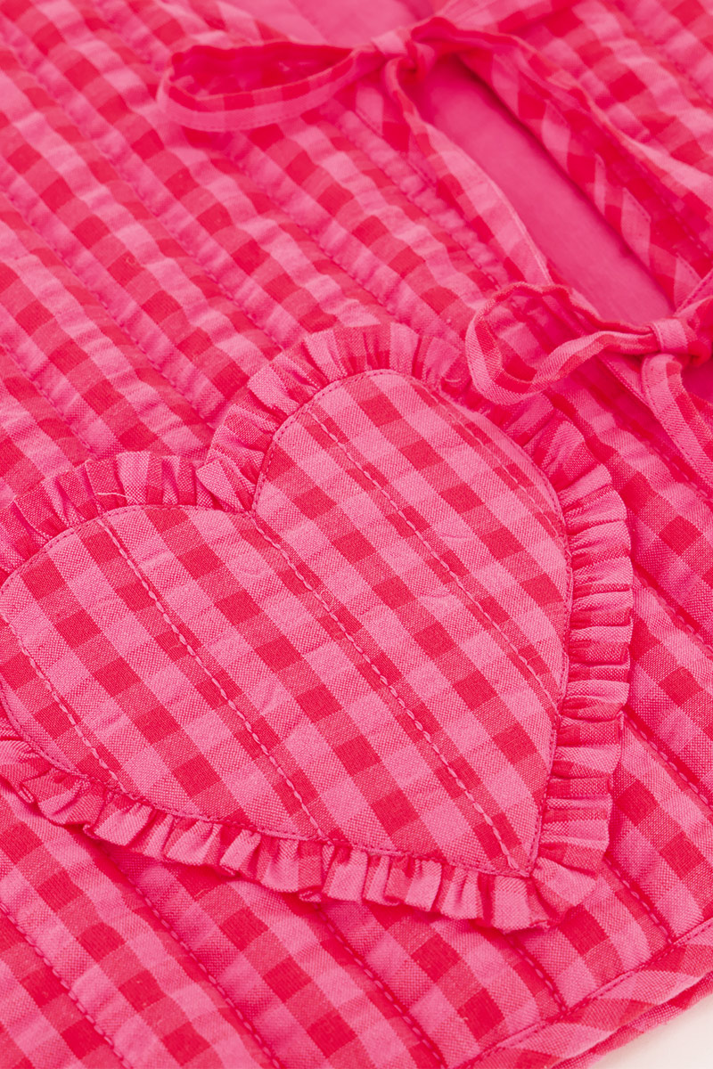 Pink striped gilet with bows & heart shaped pockets | My Jewellery