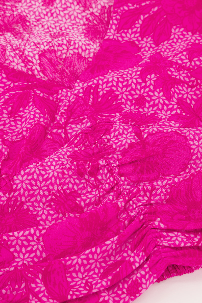 Roze top met bloemenprint en smock