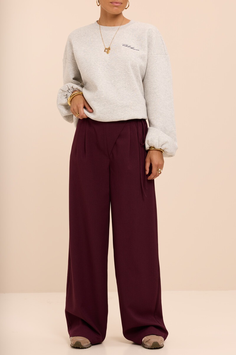Burgundy wide leg trousers with wrap and bow | My Jewellery