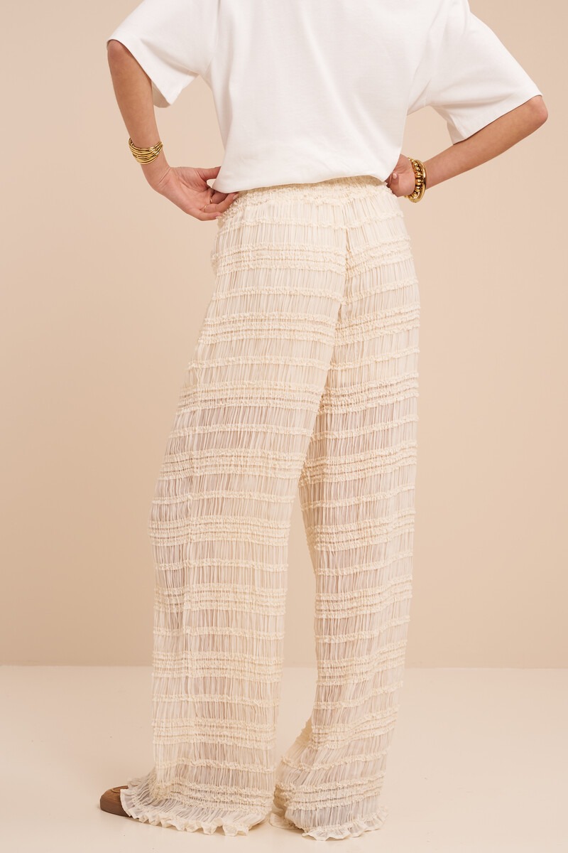White wide leg trousers with ruflles | My Jewellery