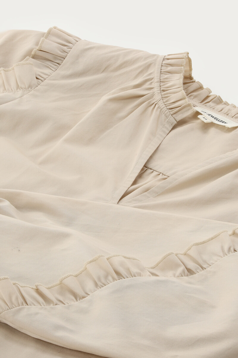Beige blouse with ruffles | My Jewellery