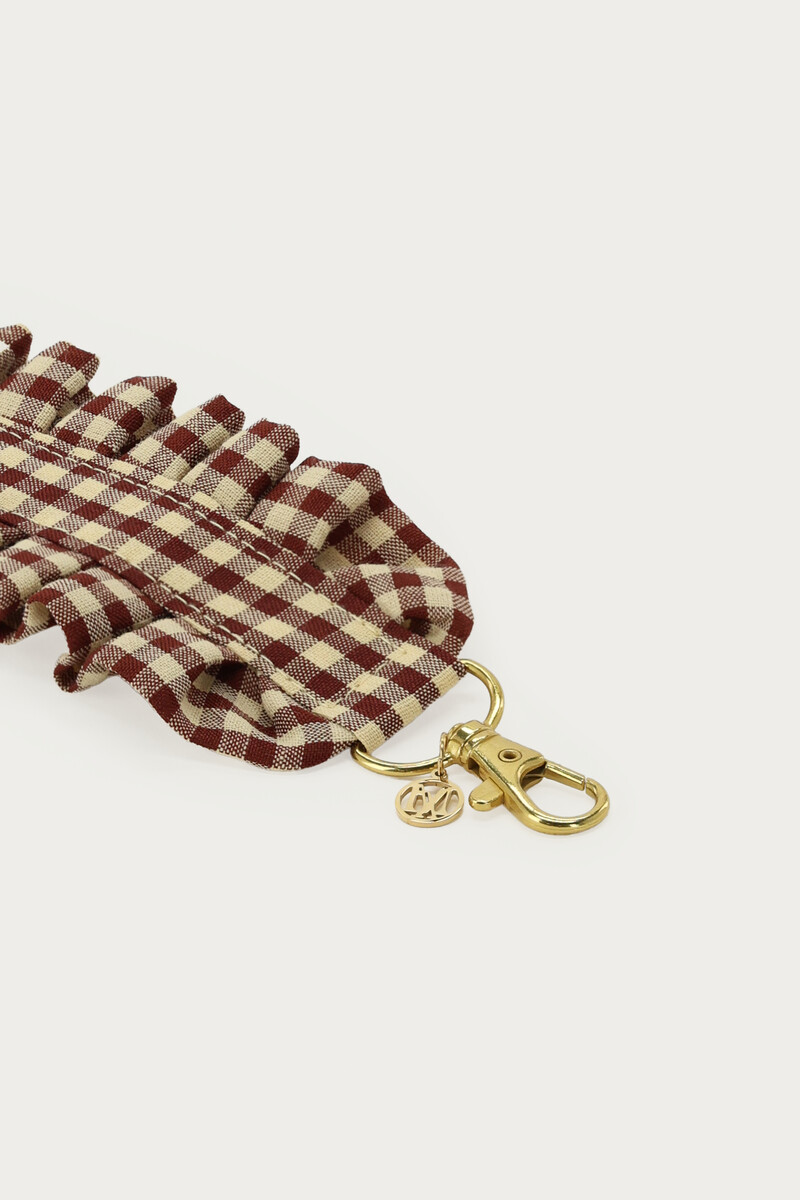 Beige phone cord with ruffle and diamond | My Jewellery