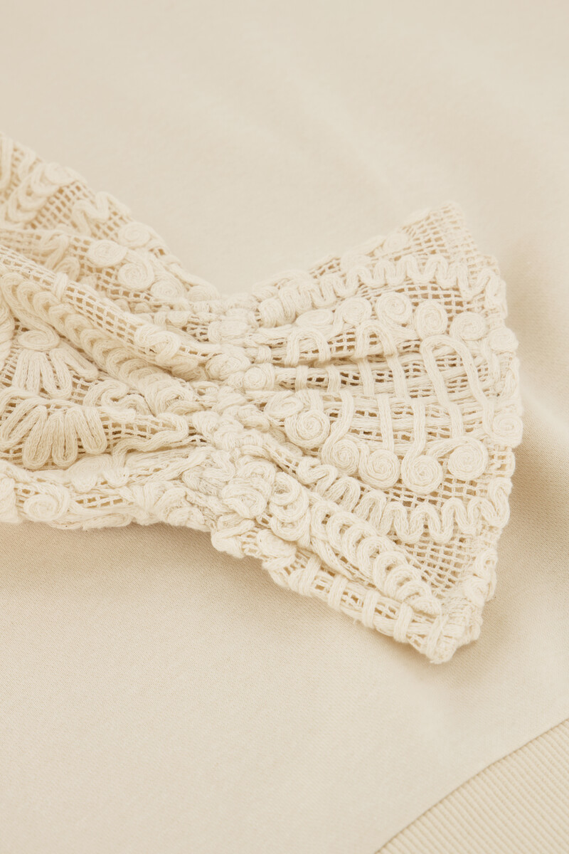 Beige sweater with crochet sleeve details | My Jewellery