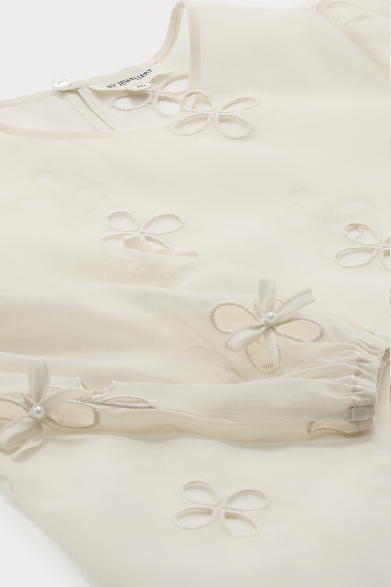 Beige top with broderie anglaise and bows | My Jewellery