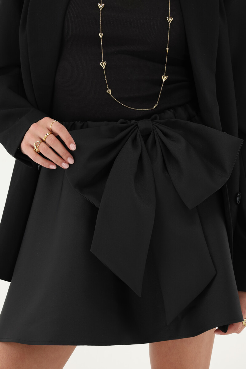 Black mini skirt with statement bow | My Jewellery