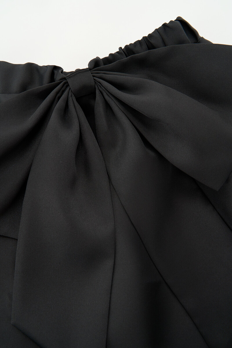 Black mini skirt with statement bow | My Jewellery