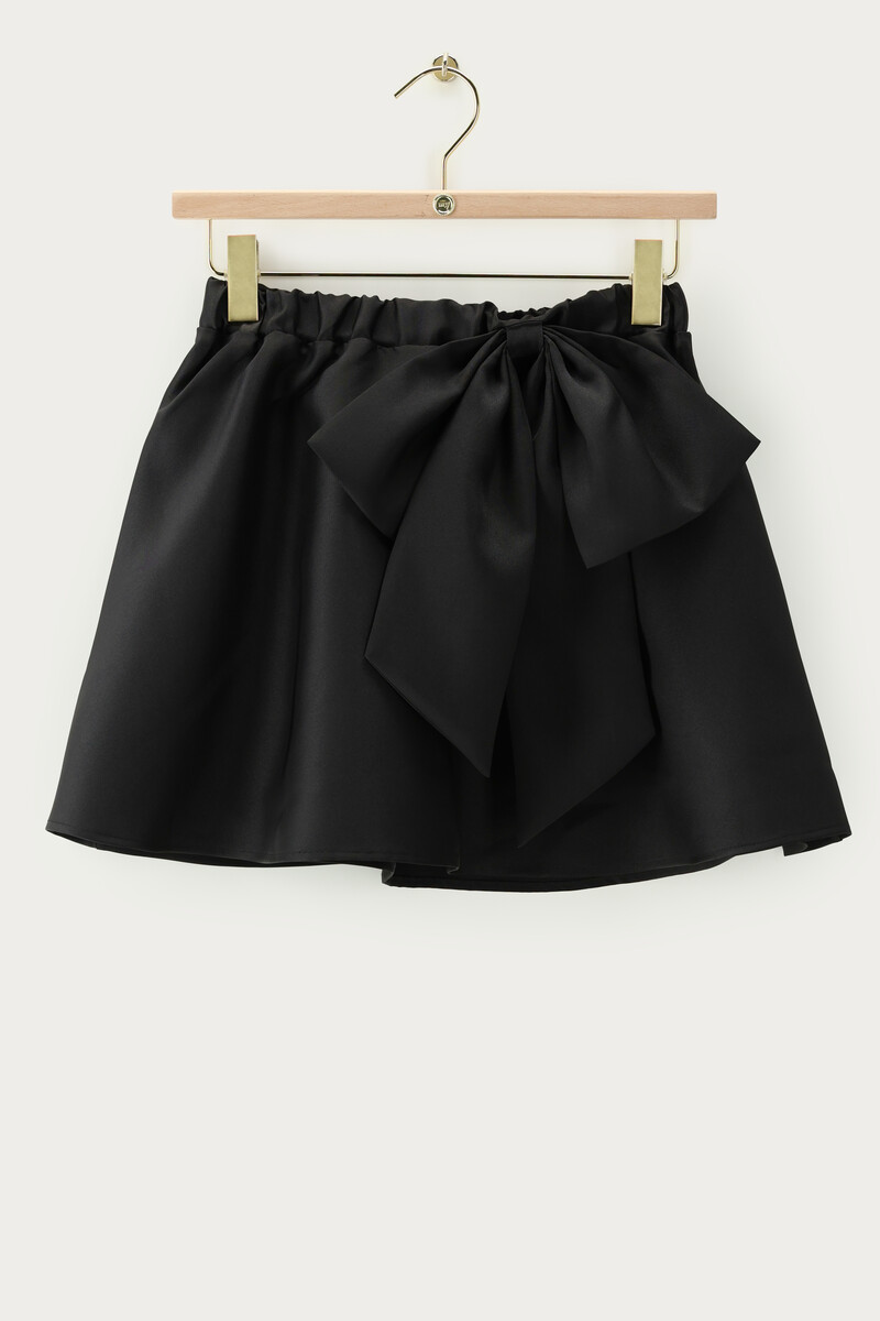 Black mini skirt with statement bow | My Jewellery