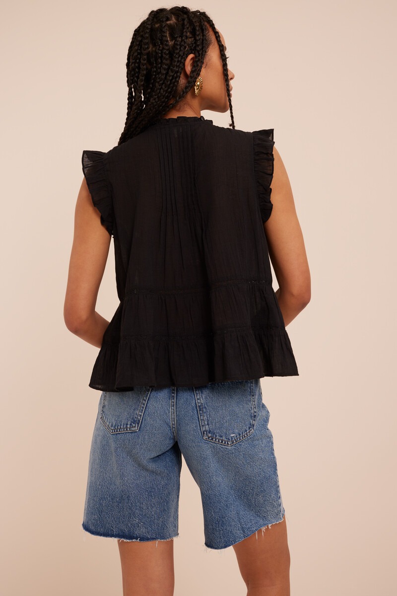 Black sleeveless top with ruffles and V-neck | My Jewellery