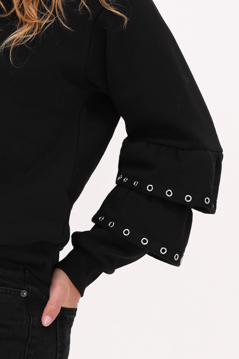 Black sweater with ruffle sleeves and studs | My Jewellery