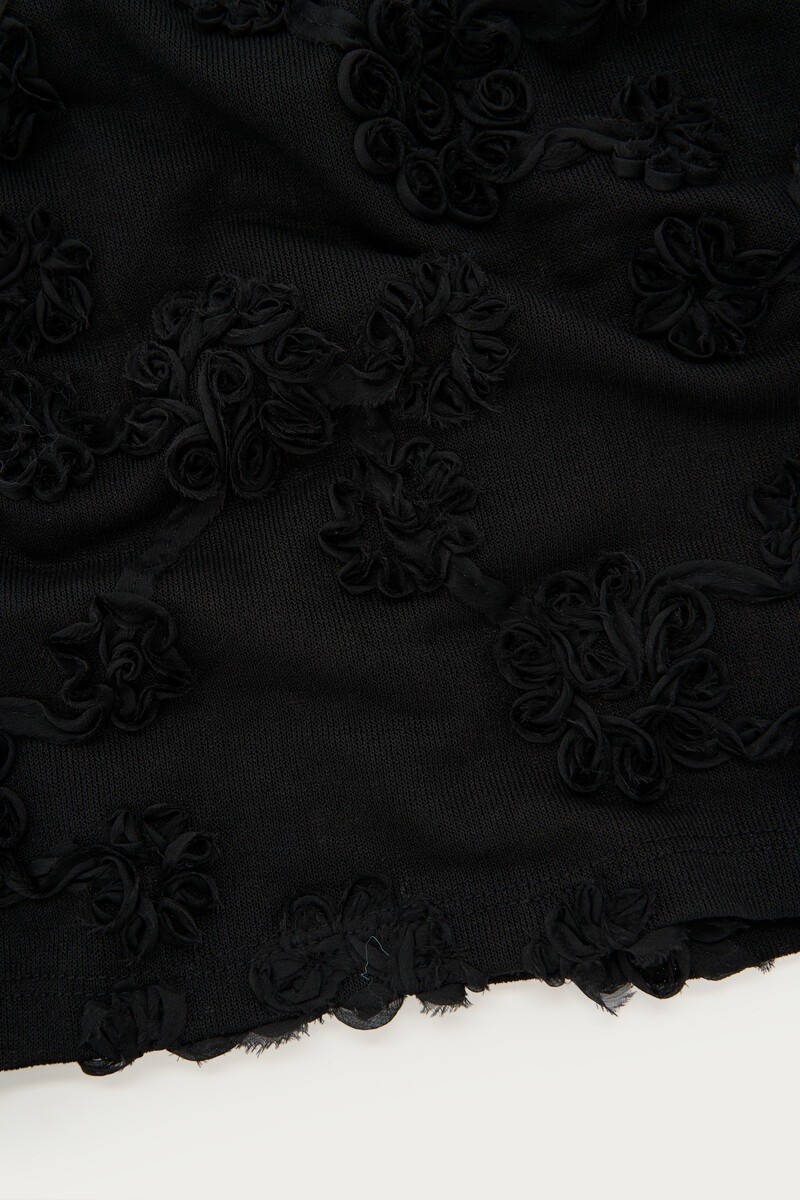 Black top with long sleeves and embroidered flowers | My Jewellery