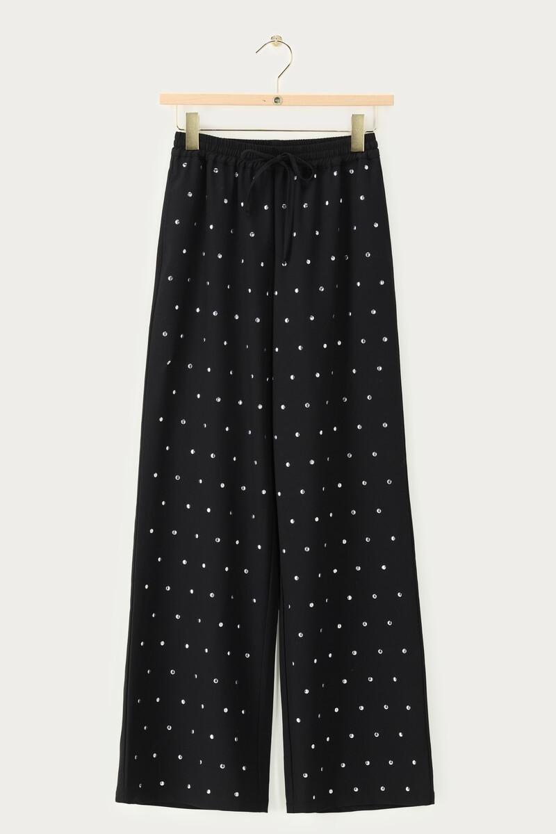 Black trousers with silver-coloured studs | My Jewellery