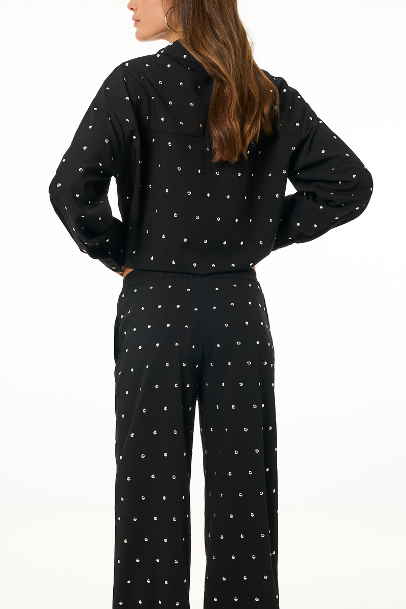 Black trousers with silver-coloured studs | My Jewellery