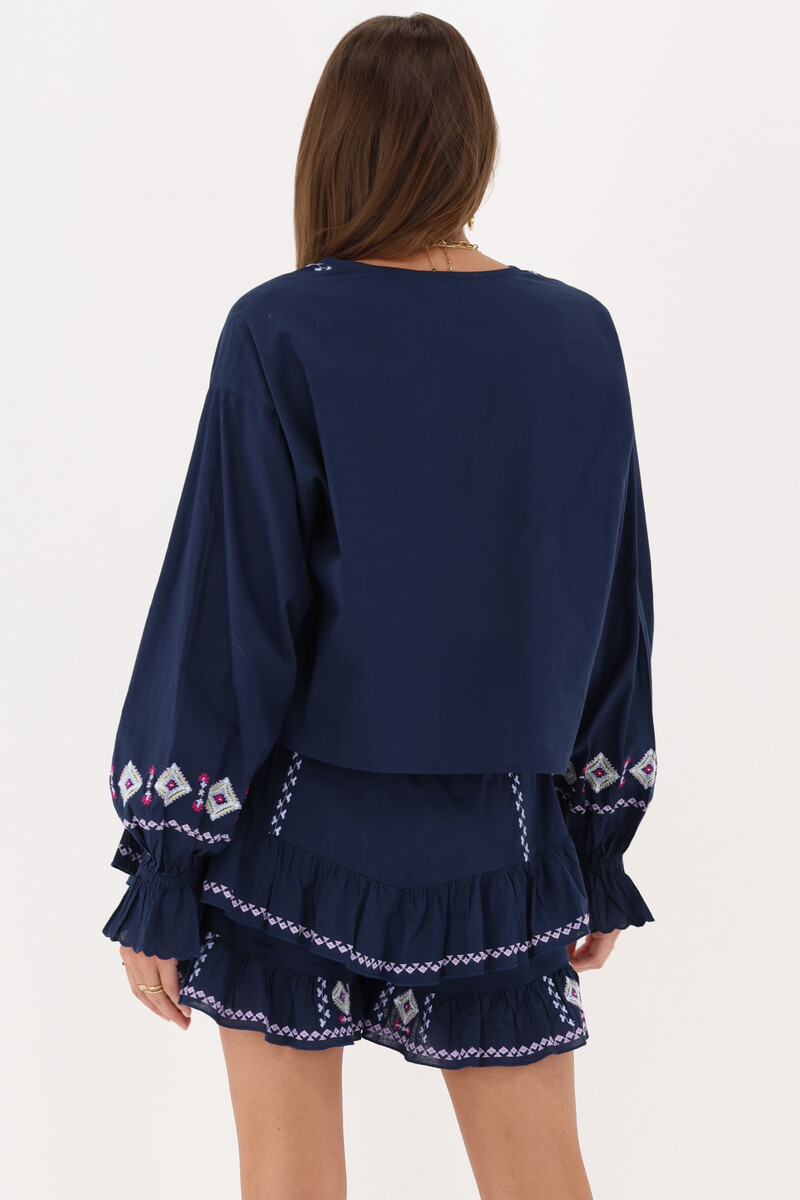 Blue top with bows & embroidery details | My Jewellery