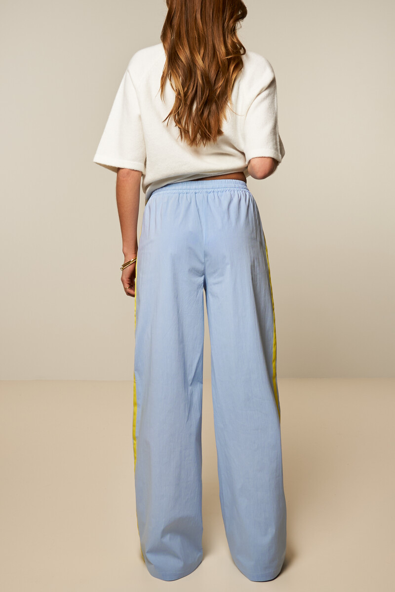 Blue wide leg trousers with contrast stripe | My Jewellery