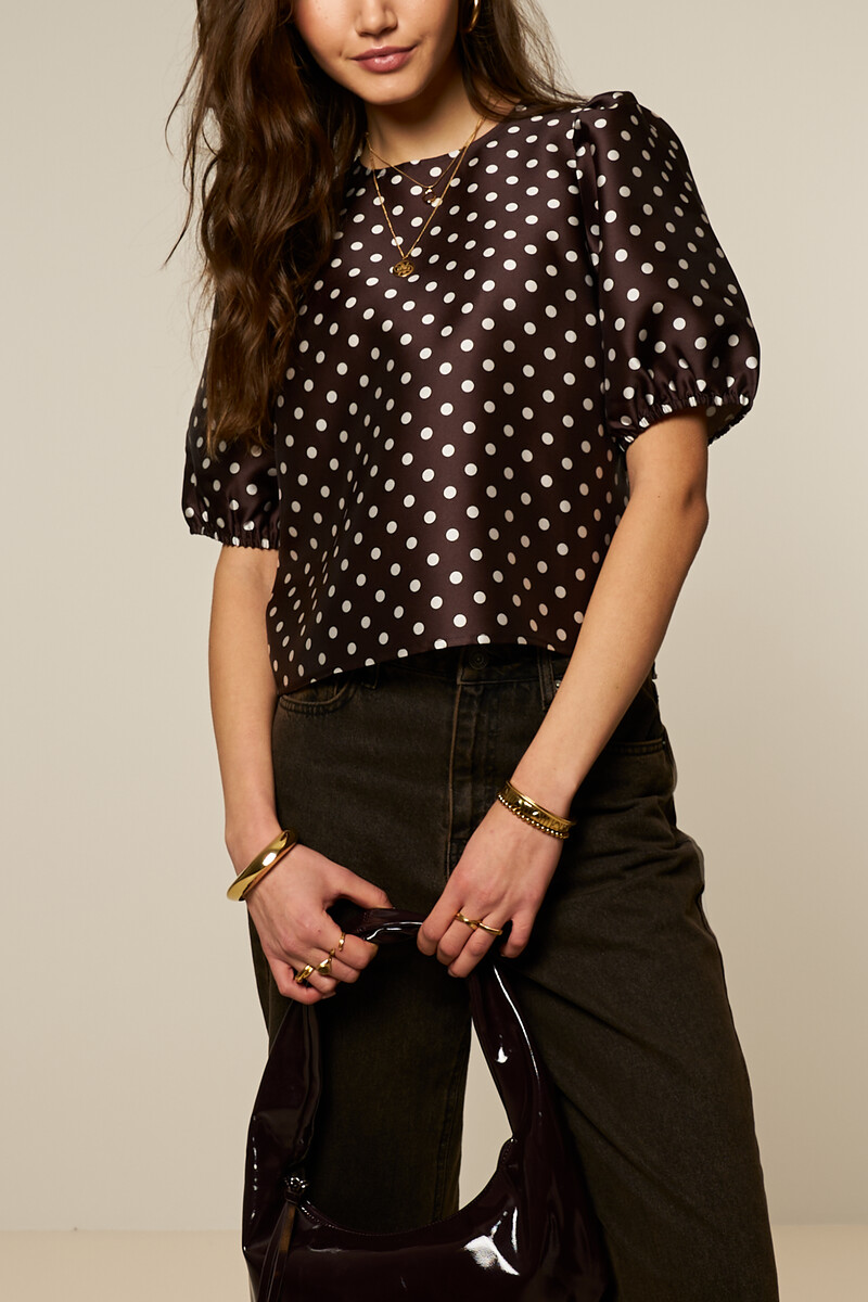 Brown polka dot top with short puff sleeves