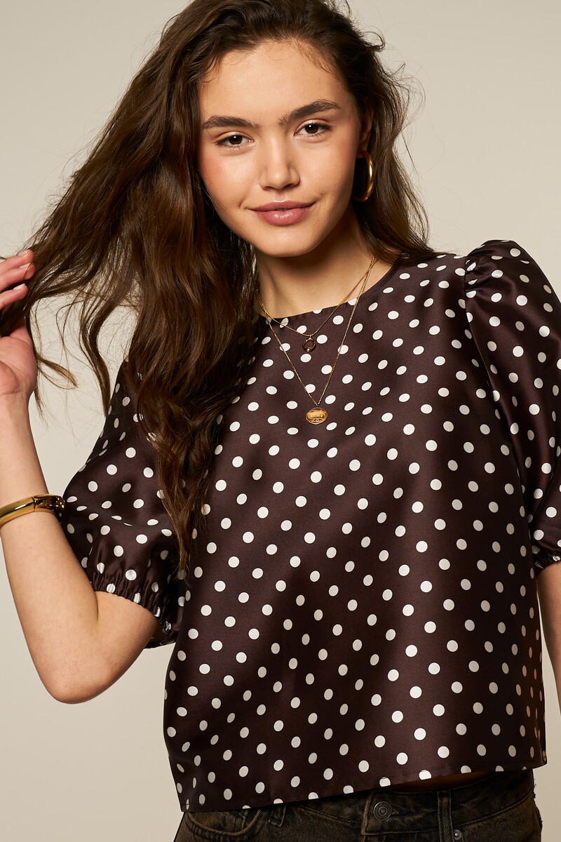 Brown polka dot top with short puff sleeves