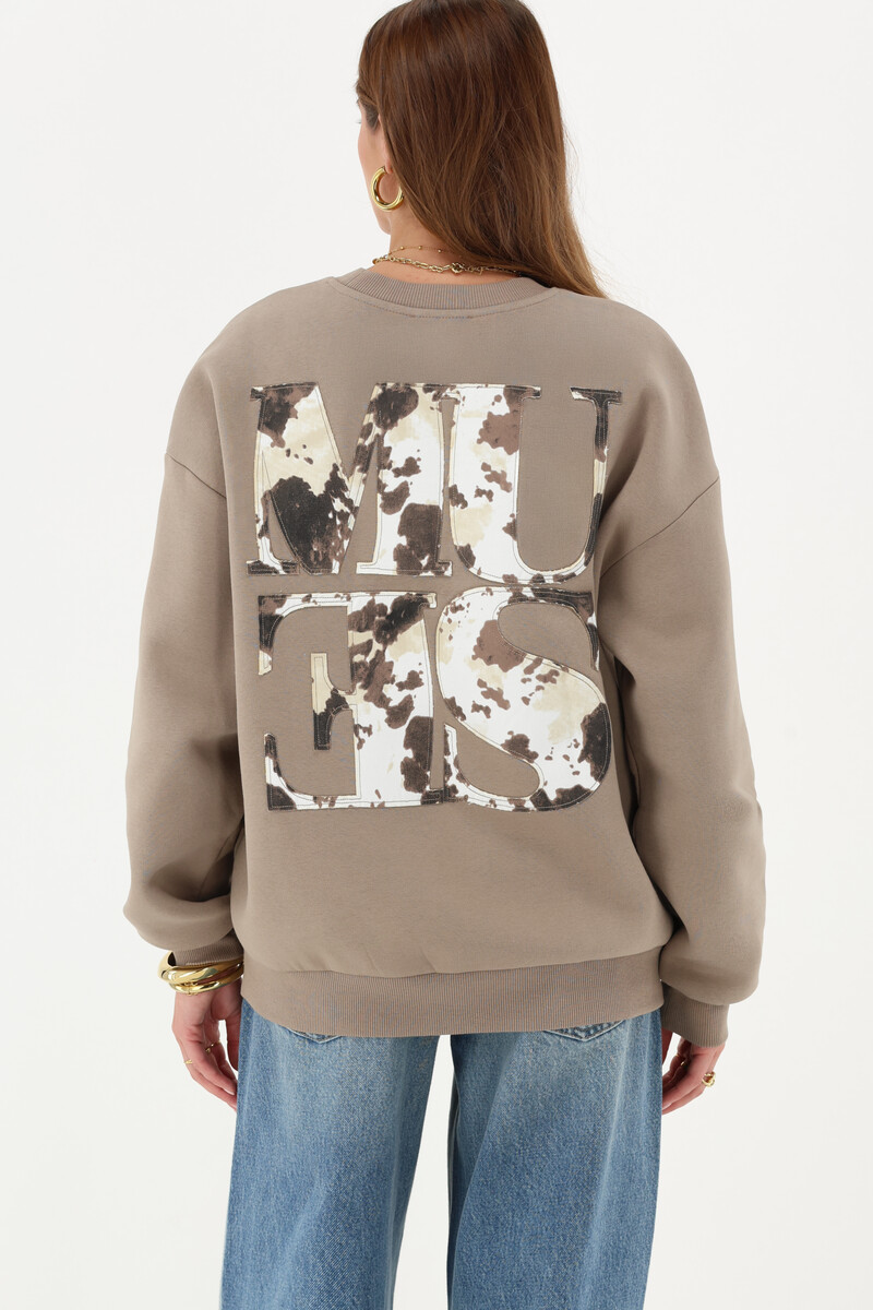 Brown sweatshirt with cow print “Muse” patch | My Jewellery