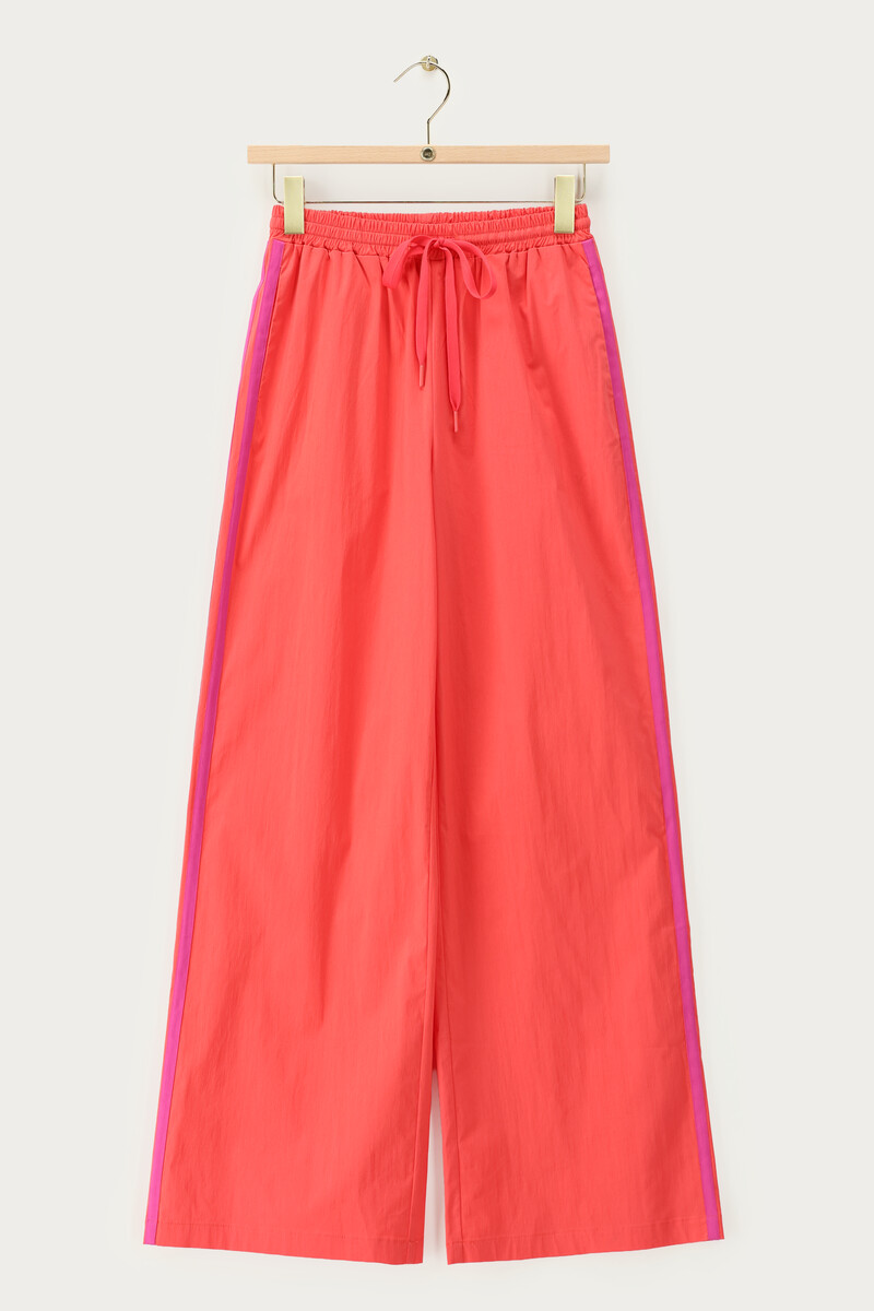 Coral wide leg trousers with contrast stripe | My Jewellery