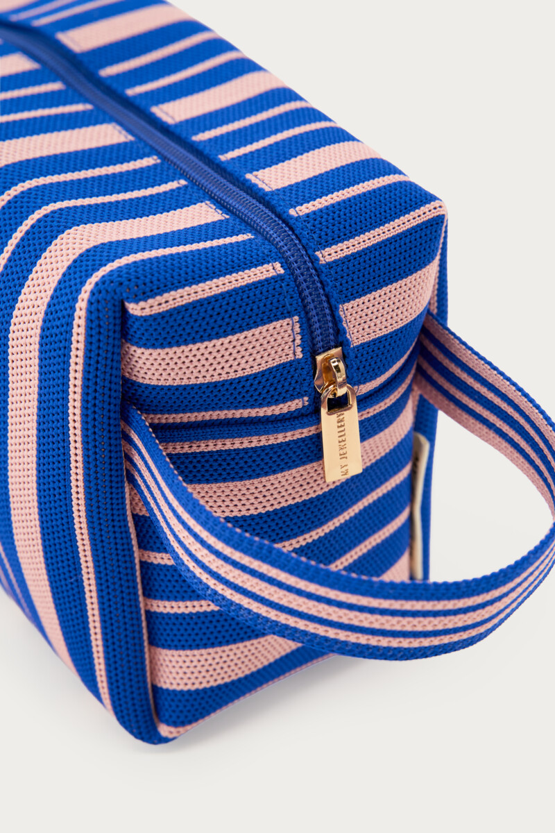 Dark blue toiletry bag with pink stripes