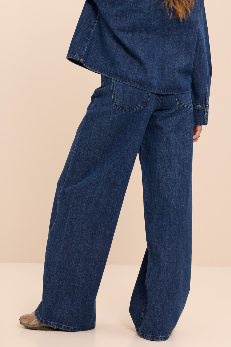 Dark blue wide leg jeans with seam detail and pockets | My Jewellery