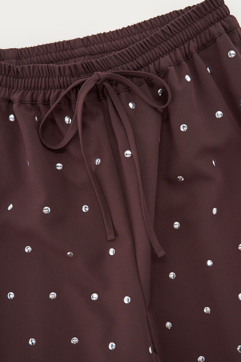 Dark brown pants with silver studs | My Jewellery