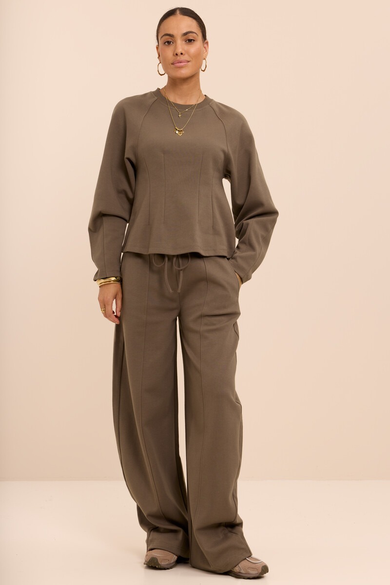 Dark green sweater with barrel sleeves | My Jewellery