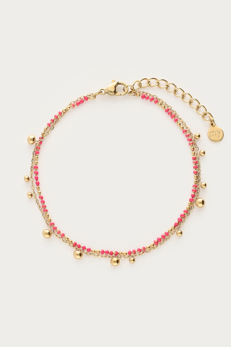 Double bracelet with pink beads & polka dots