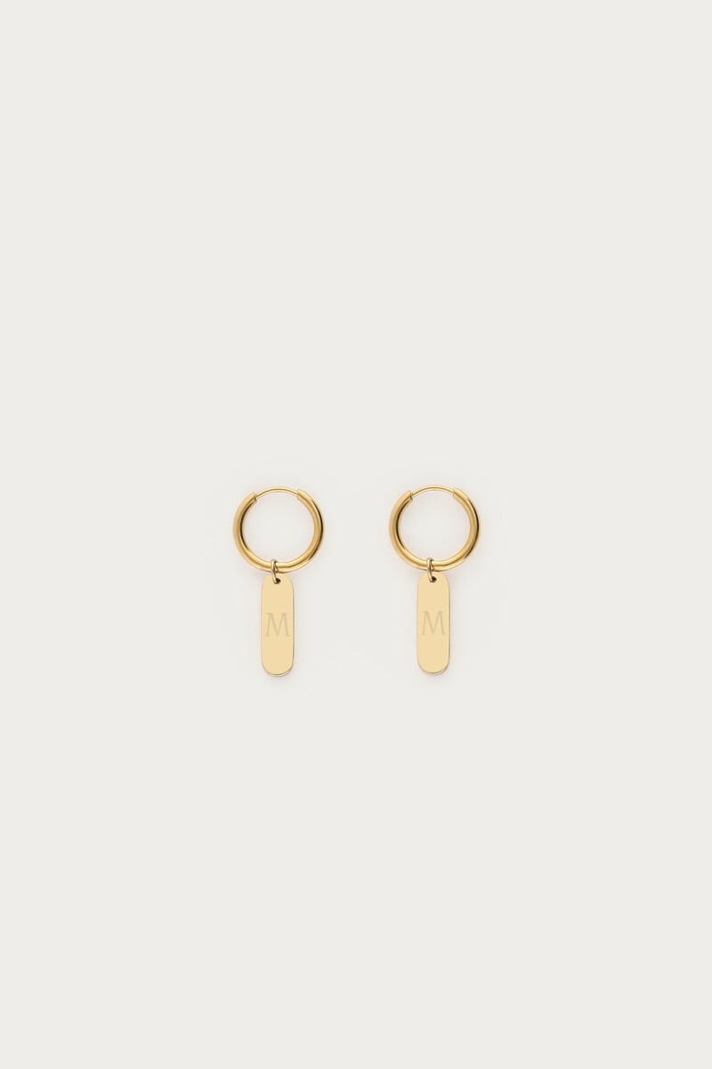 Engraved earrings with charm