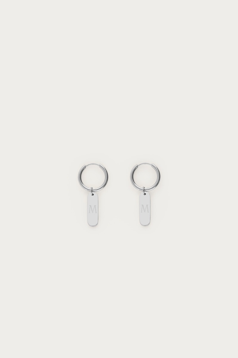 Engraved earrings with charm