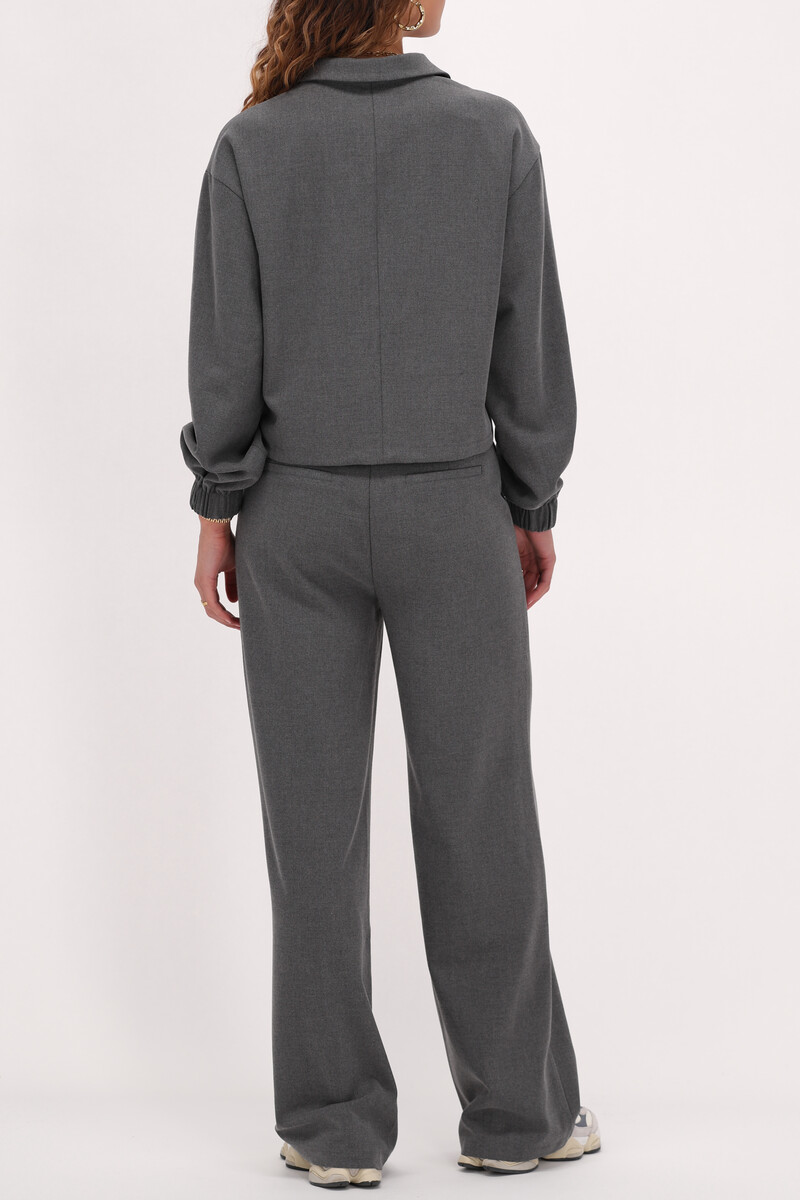 Grey wide leg pants with concealed button down shirt