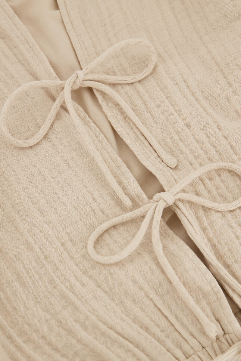 Hydrophilic beige blouse with bows | My Jewellery