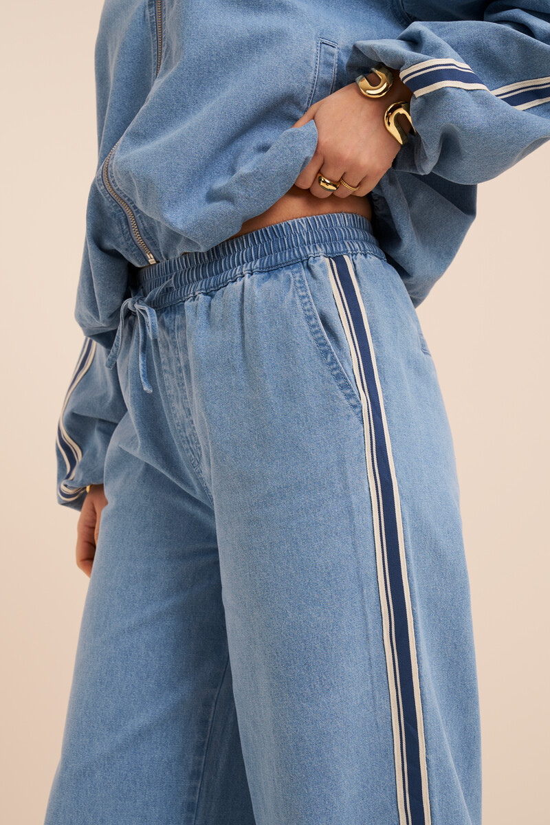 Light blue denim trousers with stripes | My Jewellery
