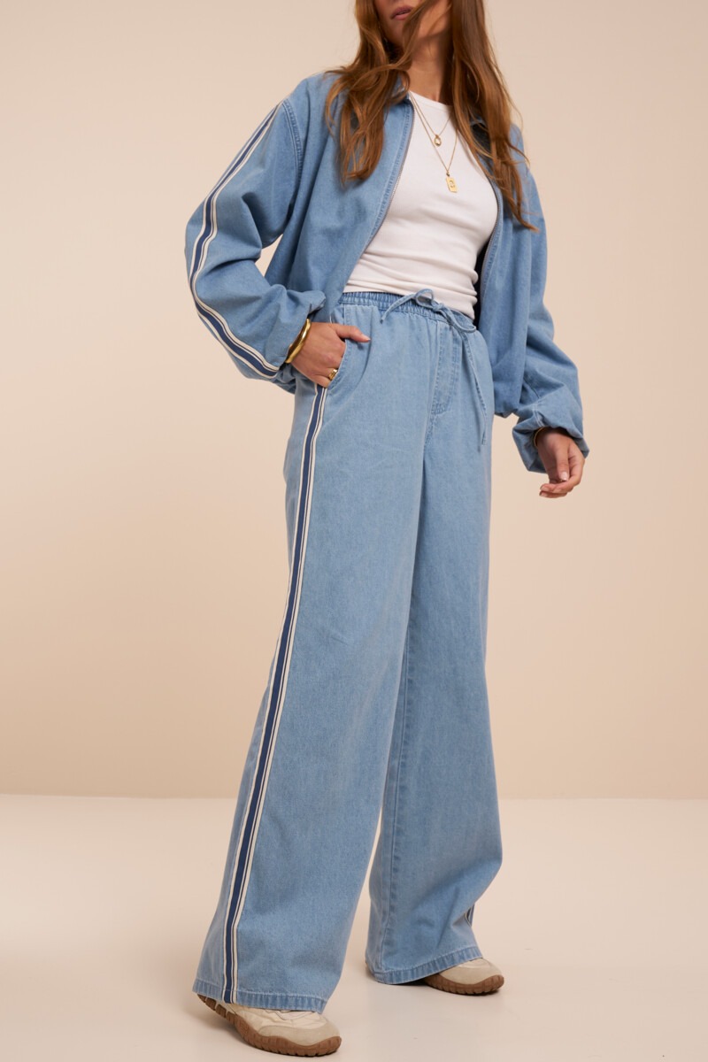 Light blue denim trousers with stripes 