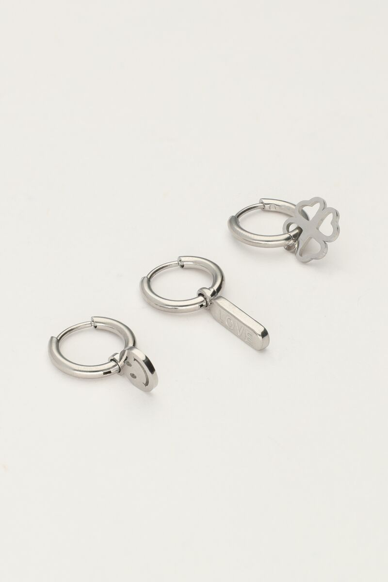 Set of three hoop earrings with clover and smiley