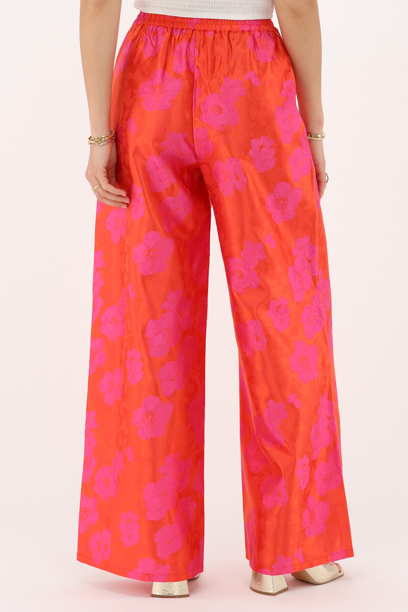 Orange jacquard wide leg trousers with pink flowers | My Jewellery