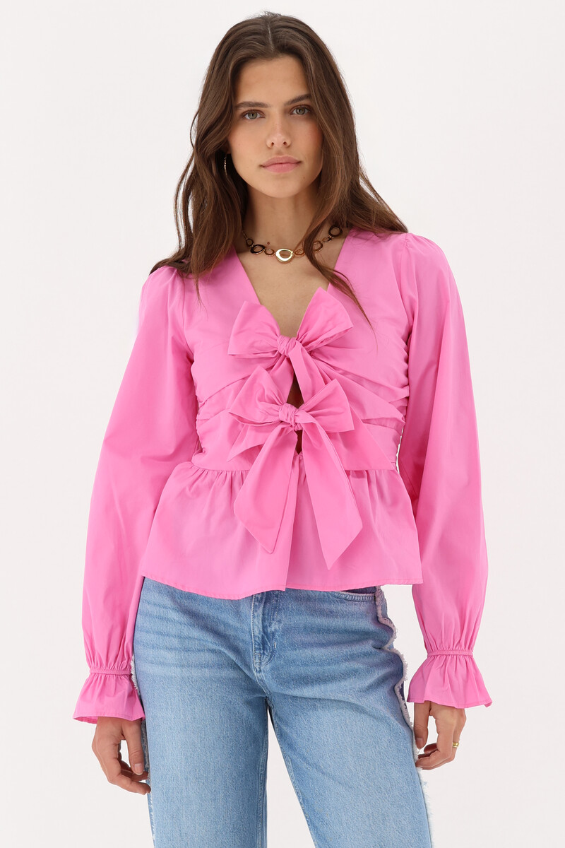 Pink top with bows & peplum | My Jewellery