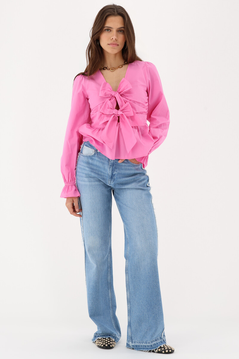 Pink top with bows & peplum | My Jewellery