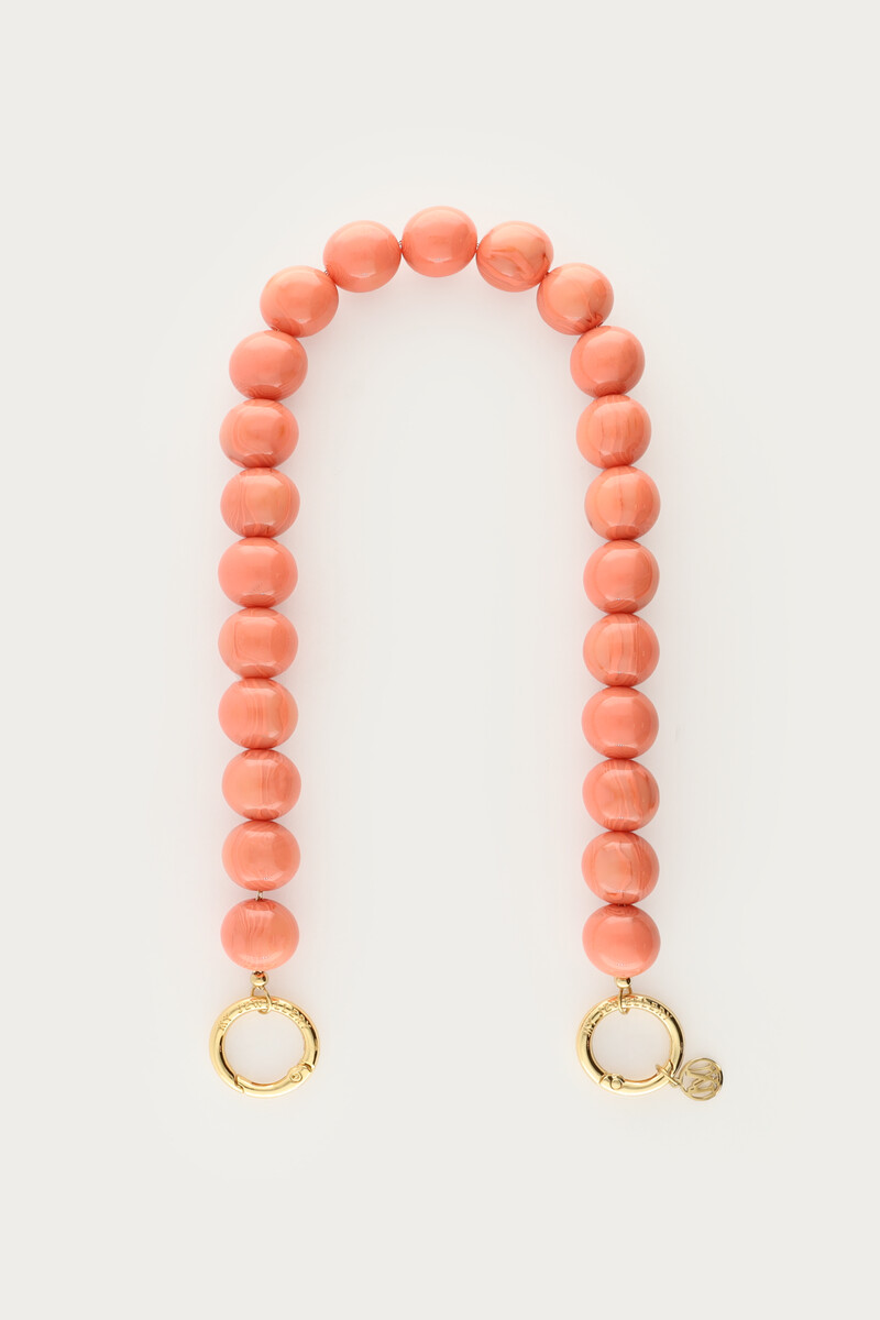 Peach phone cord with round beads | My Jewellery