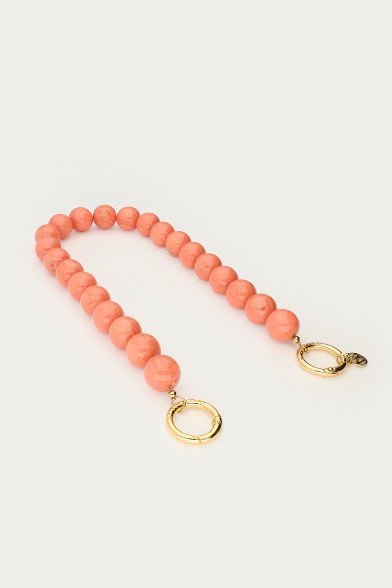 Peach phone cord with round beads | My Jewellery