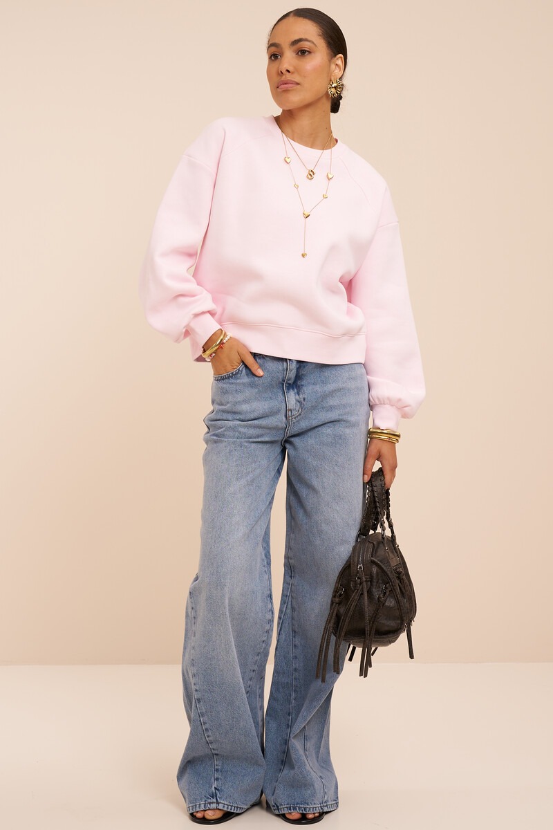 Roze basic sweater met ballonmouwen