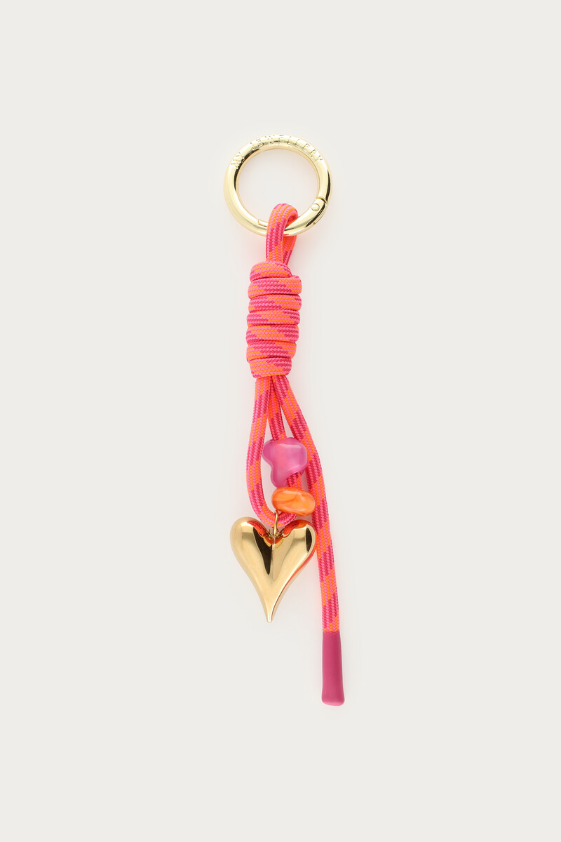 Roze hartjes bag charm met koord en kralen