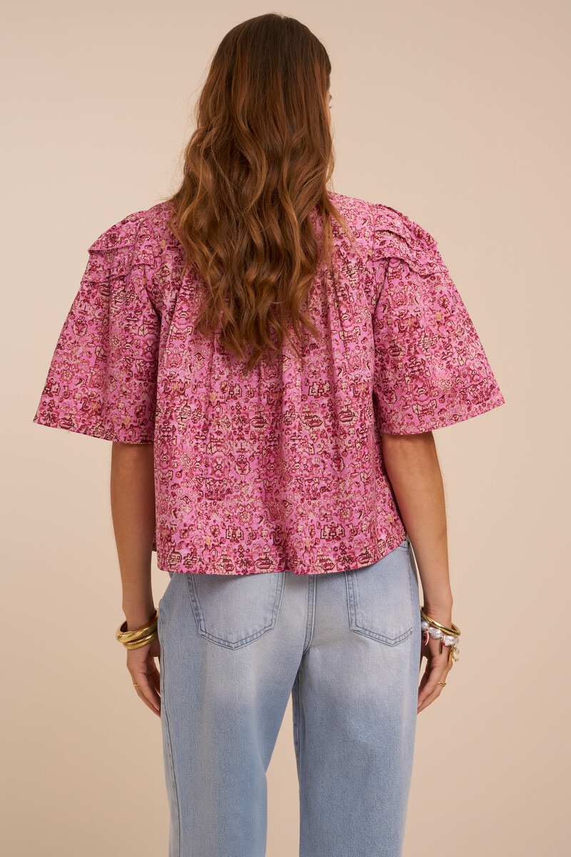Pink ruffle blouse with short sleeves and floral print | My Jewellery