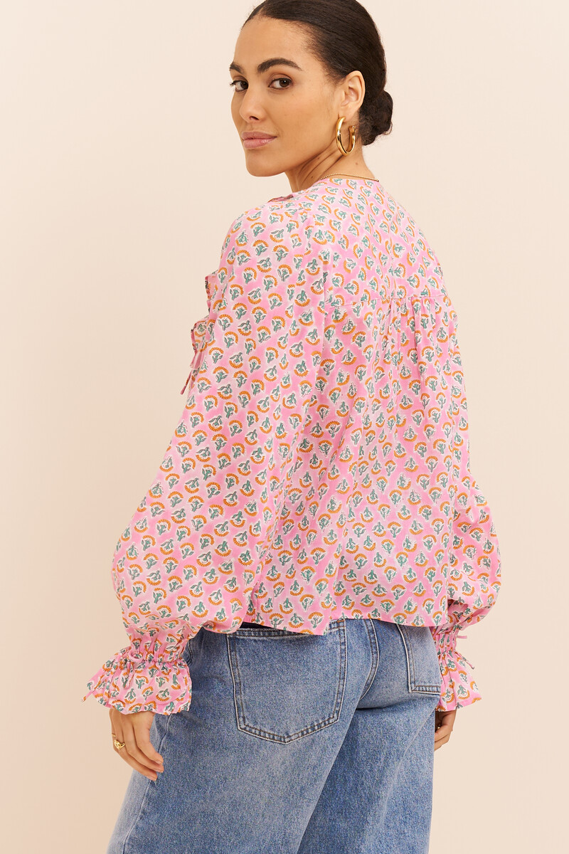 Pink ruffle top with print | My Jewellery