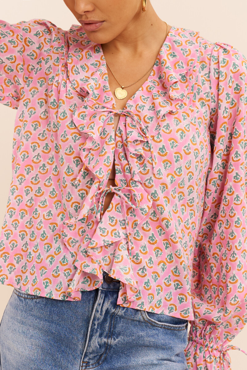 Pink ruffle top with print | My Jewellery
