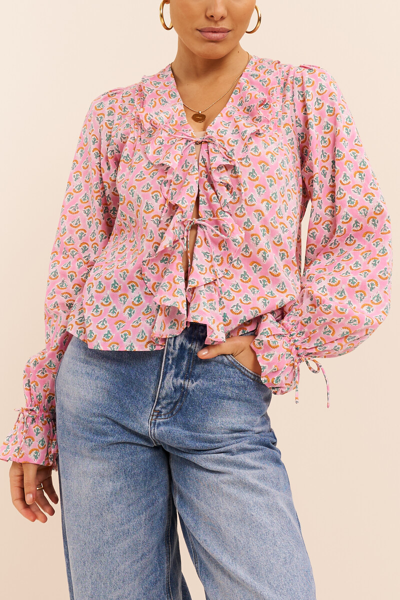 Pink ruffle top with print | My Jewellery