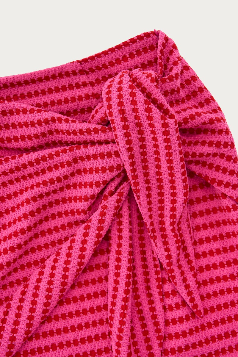 Pink short crochet skirt with bow detail | My Jewellery