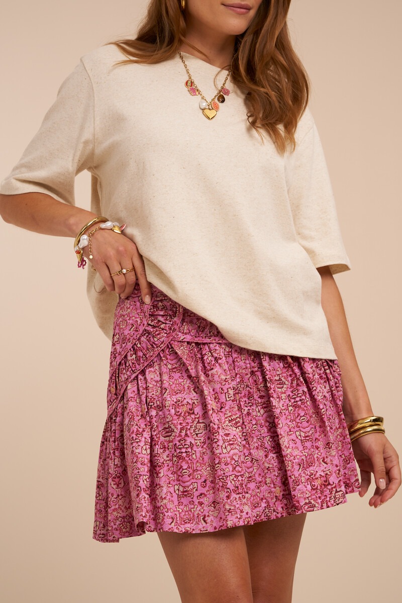 Pink short skirt with ruffles and floral print | My Jewellery